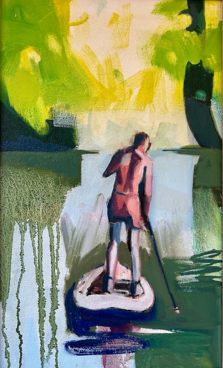 A standing figure paddleboarding in green water